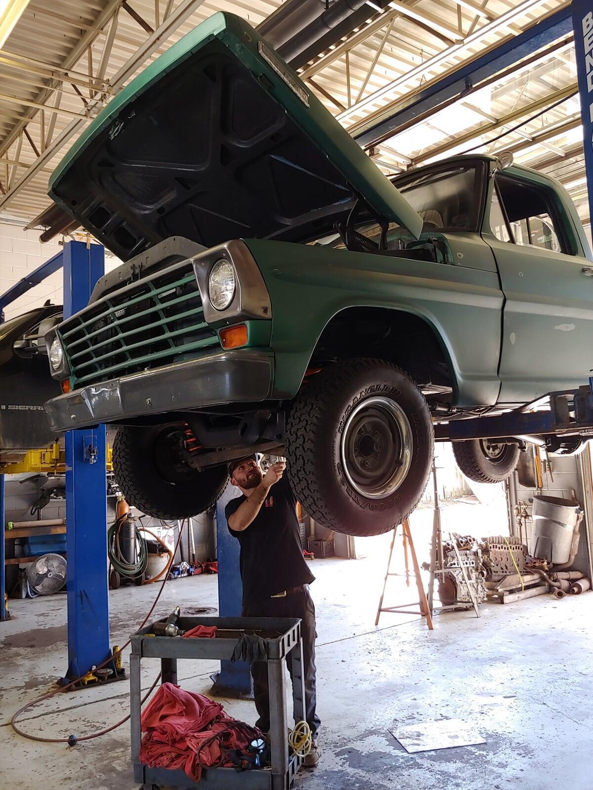 Barry's Auto working on a car